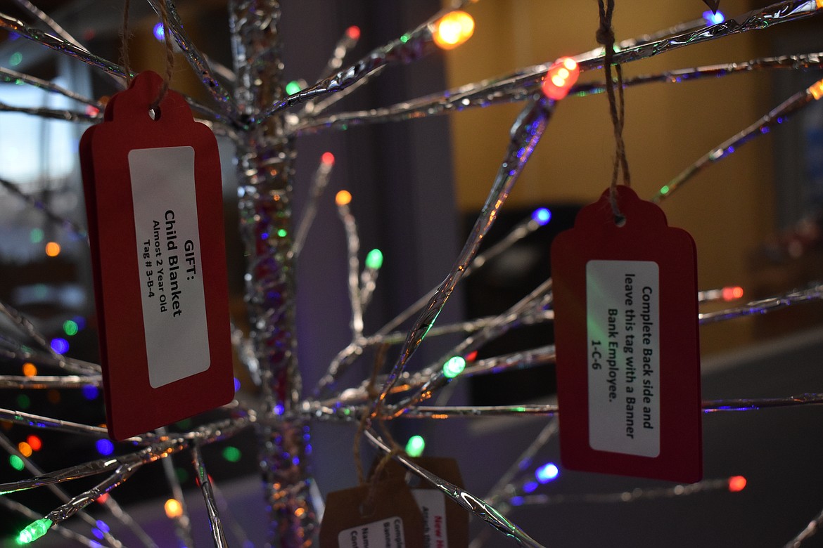 Tags on Banner Bank’s Wishing Tree include requests for items, such as a child’s blanket, a woman’s scarf and Walmart gift cards.