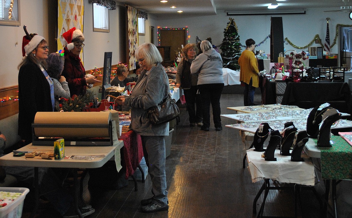 Shoppers who braved the snowy roads found a wonderful selection of handcrafted and homemade Christmas gifts at the St. Regis Christmas Bazaar on Saturday. (Amy Quinlivan/Mineral Independent)