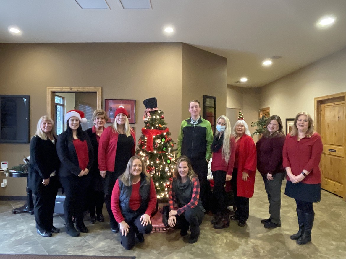 Post Falls Chamber of Commerce Ambassadors heading out to spread Christmas Cheer among our members.