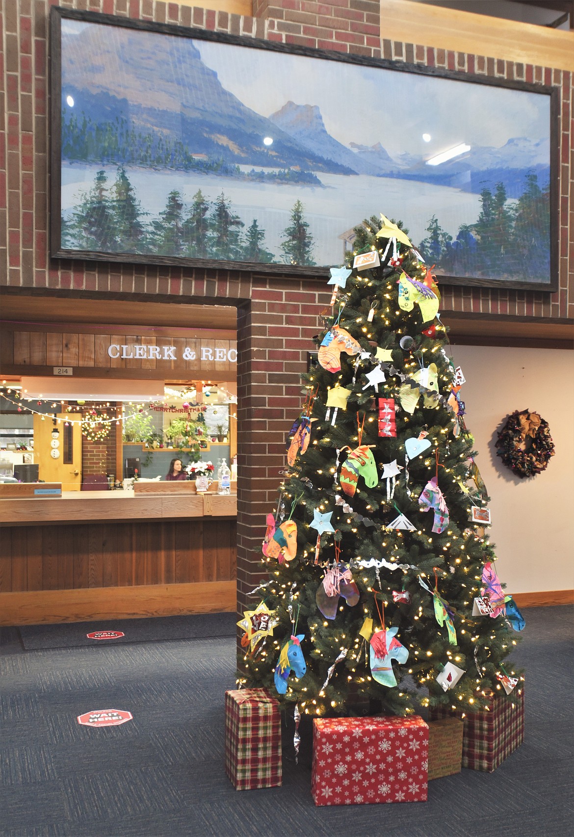 Students from Valley View School and Dayton Elementary School made ornaments for this Christmas tree on the second floor of the Lake County Courthouse. (Scot Heisel/Lake County Leader)