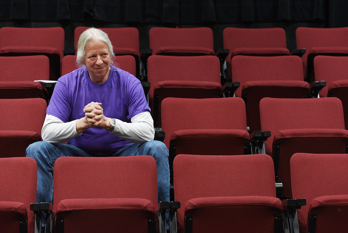 In this April 15, 2017 file photo Flathead Valley Community College Theater Arts Professor Joe Legate sits in the school's theater before a rehearsal. (Aaric Bryan/Daily Inter Lake)