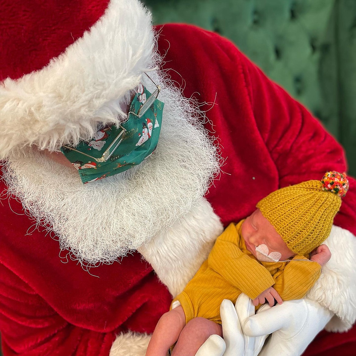 Santa holds baby Hadley Reynolds, a patient at Logan Health Children's, during a visit to the Kalispell hospital on Dec. 10. Santa and his helpers treated patients and staff to cookies and hot cocoa. Logan Health Children’s is providing Christmas toys to pediatric patients through their annual Toy Box event, sponsored by Whitefish Credit Union. To make a donation, visit online at www.justgiving.com/campaign/logan-health-toy-box. (Photo provided)