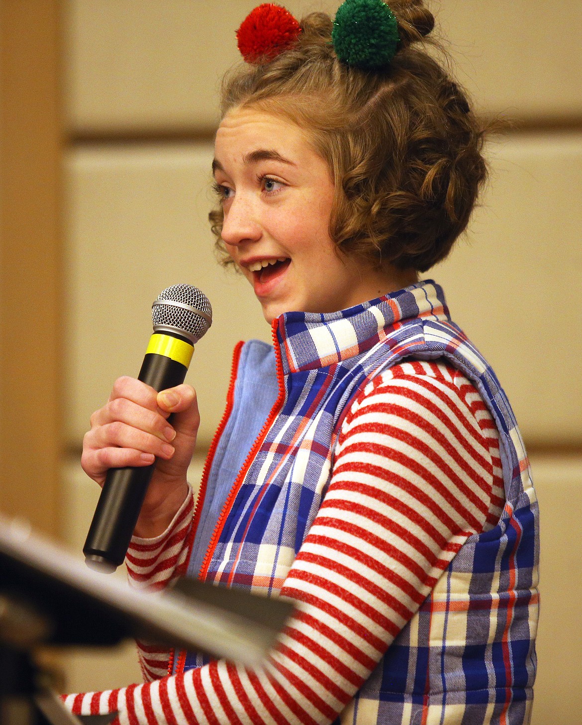 Ruby Krajic with Coeur d'Alene Summer Theatre sings at The Coeur d'Alene Regional Chamber's Upbeat Breakfast on Tuesday at The Coeur d'Alene Resort. The chamber brought in vocalists with the Summer Theatre to provide holiday cheer.