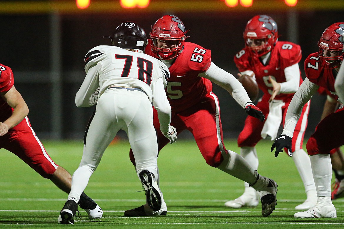 Junior Carson Laybourne (55) looks to make a block in the 4A state quarterfinal game against Shelley. Laybourne was ranked as one of the best offensive lineman in the state of Idaho.