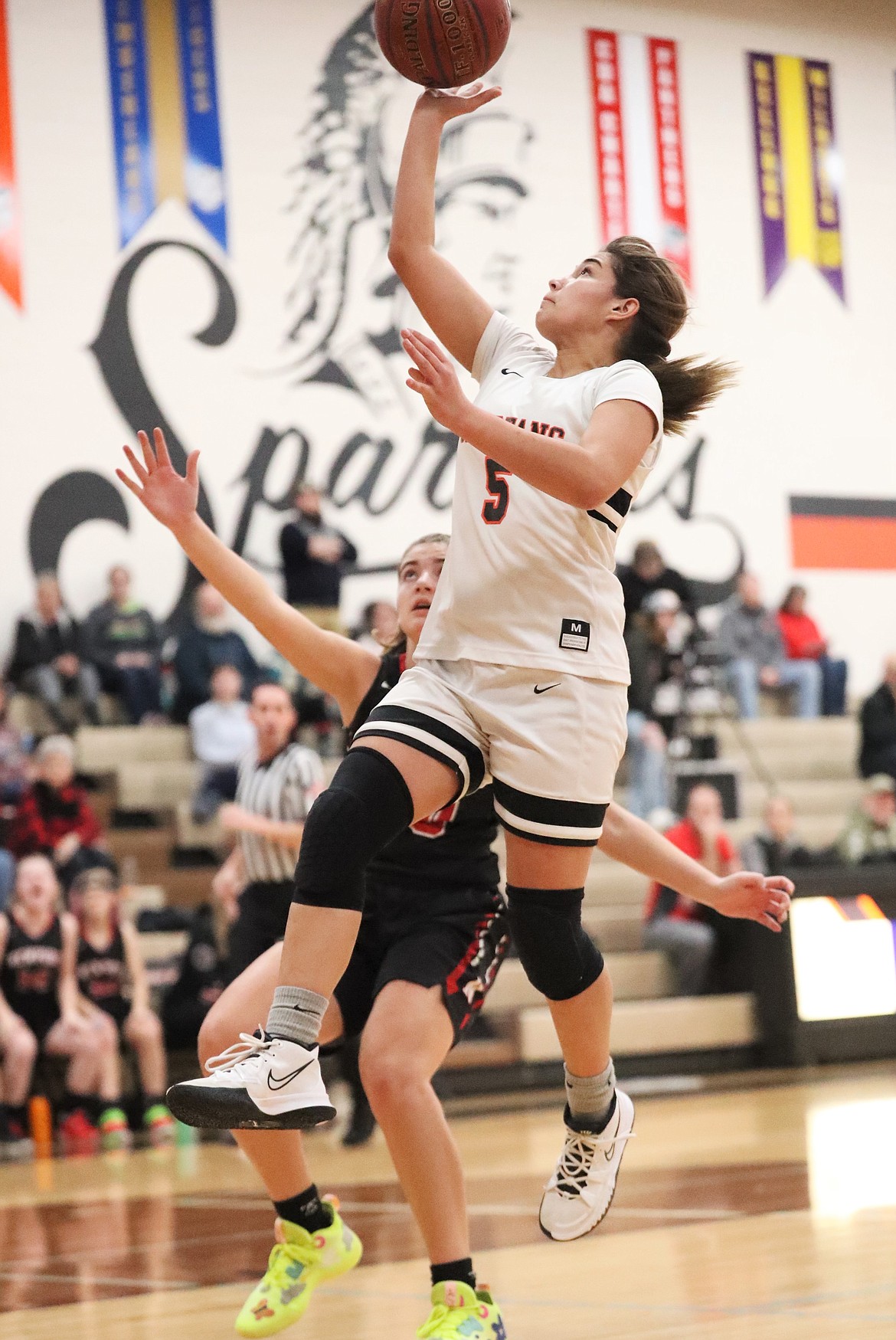 Lilly Freitas elevates for a layup Saturday.