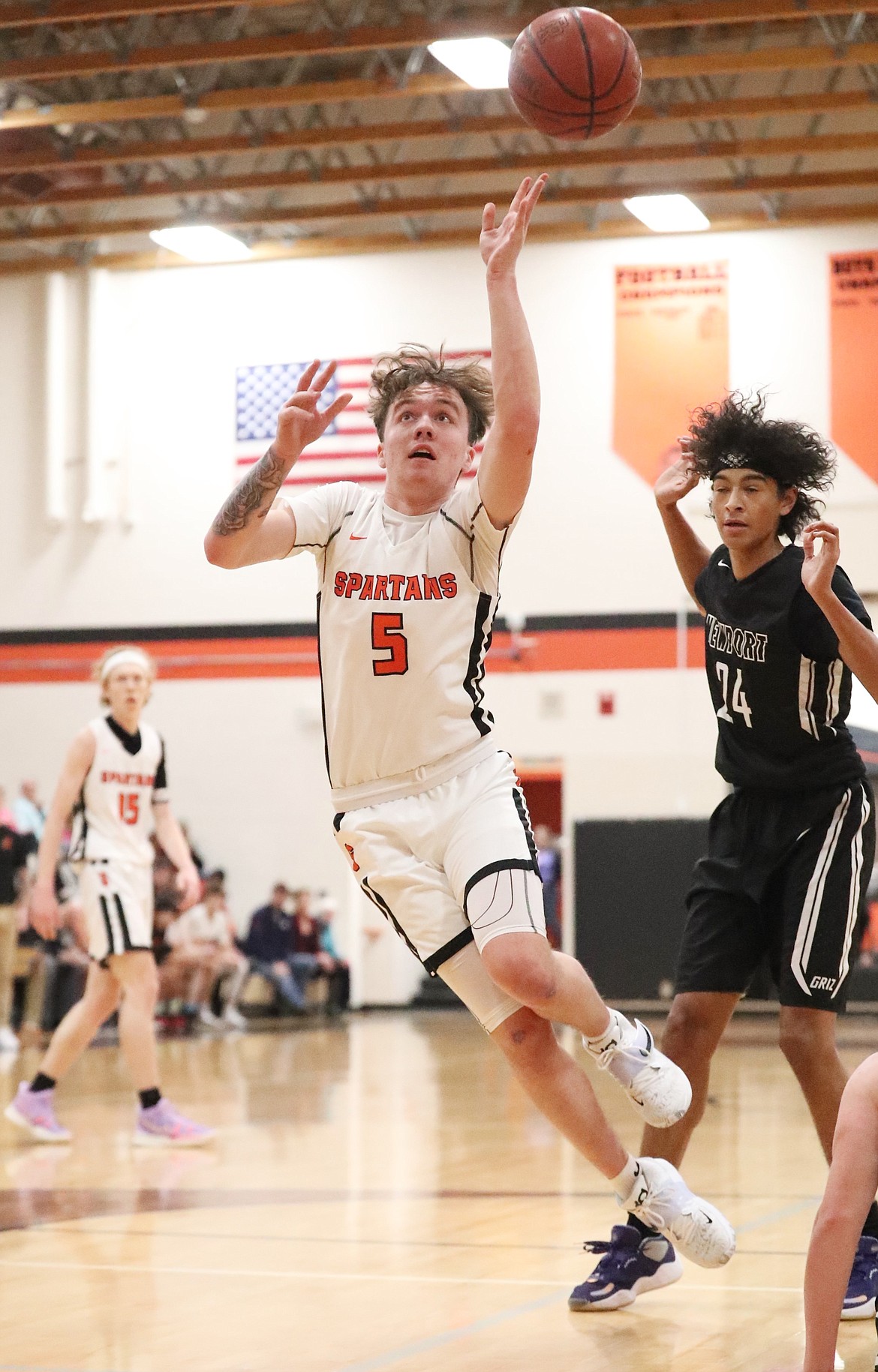 Trentyn Kreager fights through contact and attempts a layup Saturday.