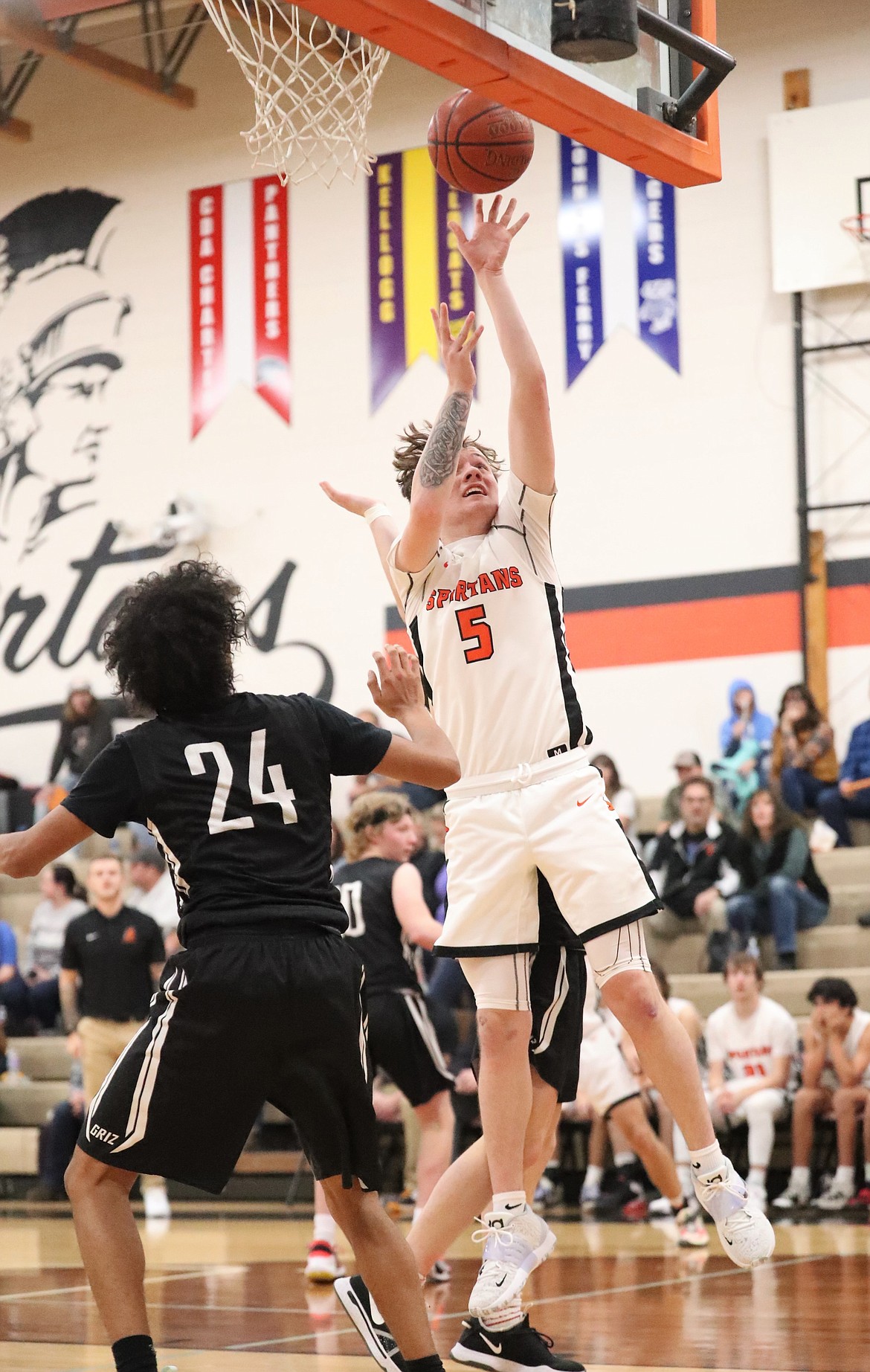 Trentyn Kreager rises up for a layup Saturday.