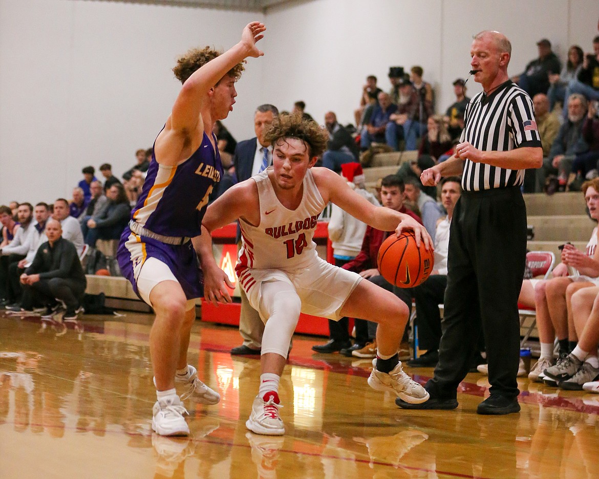 Junior Arie VanDenBerg makes a move and attempts to slip past a Lewiston defender Thursday.