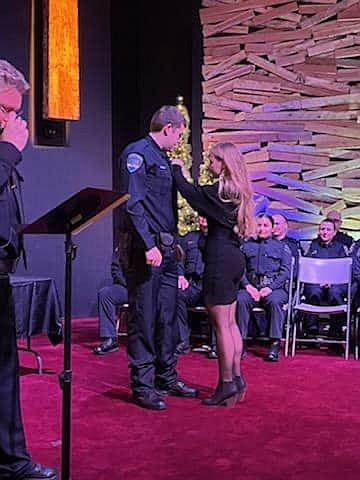 Moses Lake Police Officer Nicholas Metcalf is pinned at his graduation from the Washington State Basic Law Enforcement Academy in Spokane. Metcalf began 16 weeks of additional training with MLPD prior to patrolling on his own.