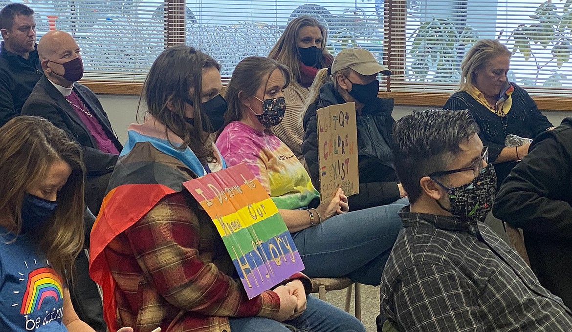 Several people who attended the Community Library Network board of trustees meeting on Thursday showed their support for the LGBTQ community by wearing rainbow-colored attire. (MADISON HARDY/Press)