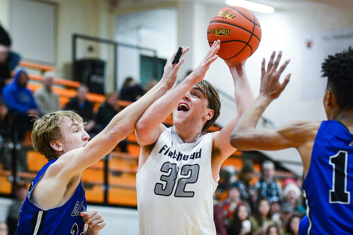 Flathead's Luca Zoeller (32) looks to shoot in the first half against Gallatin at Flathead High School on Friday, Dec. 17. (Casey Kreider/Daily Inter Lake)