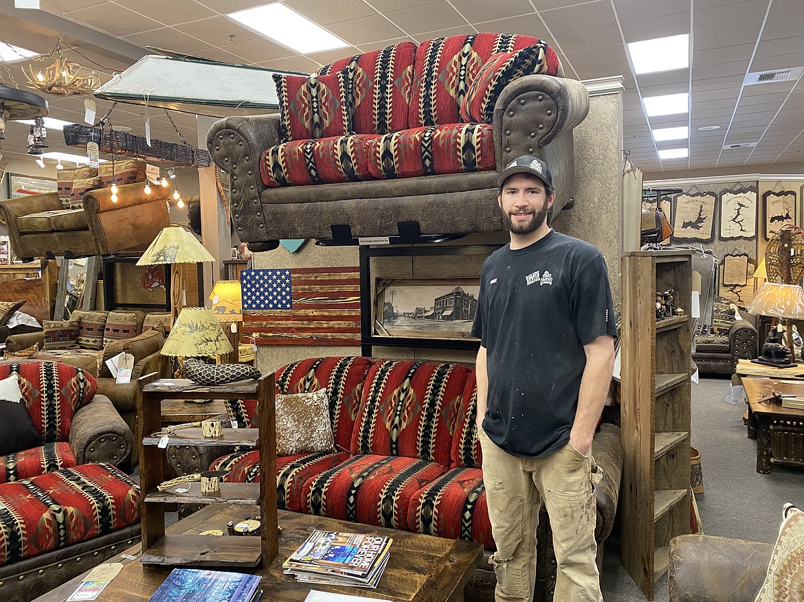 Cody Folda shown in the midst of his family's Wild West Rustic Furniture shop at 400 W. Clayton Ave. in Coeur d'Alene. The furniture and accessories are hand-crafted on site. Folda is a builder and helps manage the business.