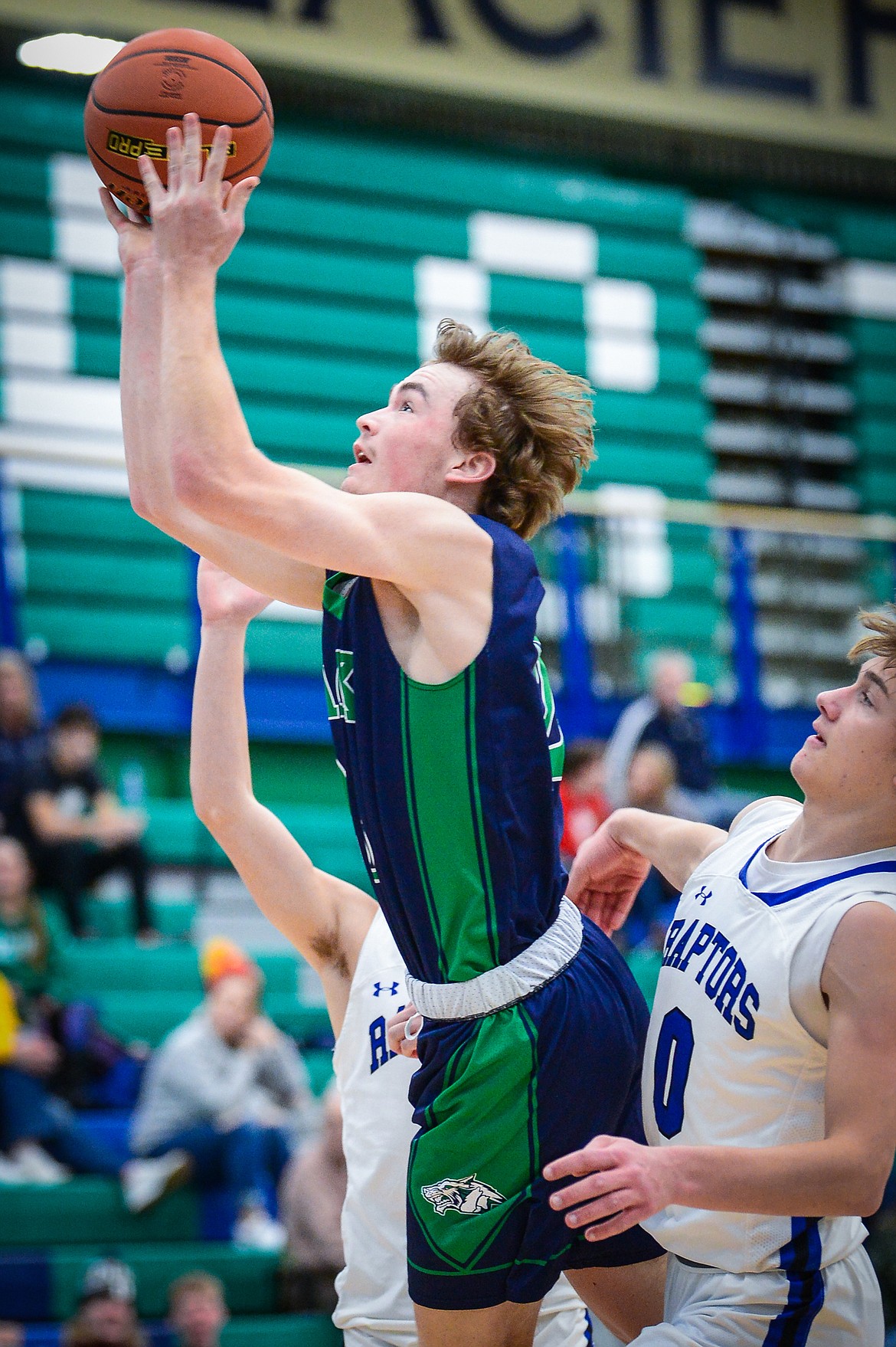 Glacier's Will Salonen (23) drives to the basket against Gallatin in the first half at Glacier High School on Saturday, Dec. 18. (Casey Kreider/Daily Inter Lake)