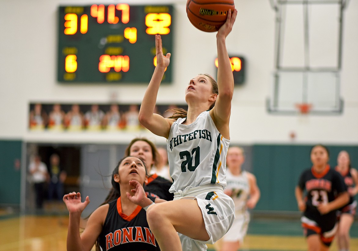 Lady Bulldog Hailey Ells gets a quick layup in a game against Ronan on Thursday at WHS. (Whitney England/Whitefish Pilot)