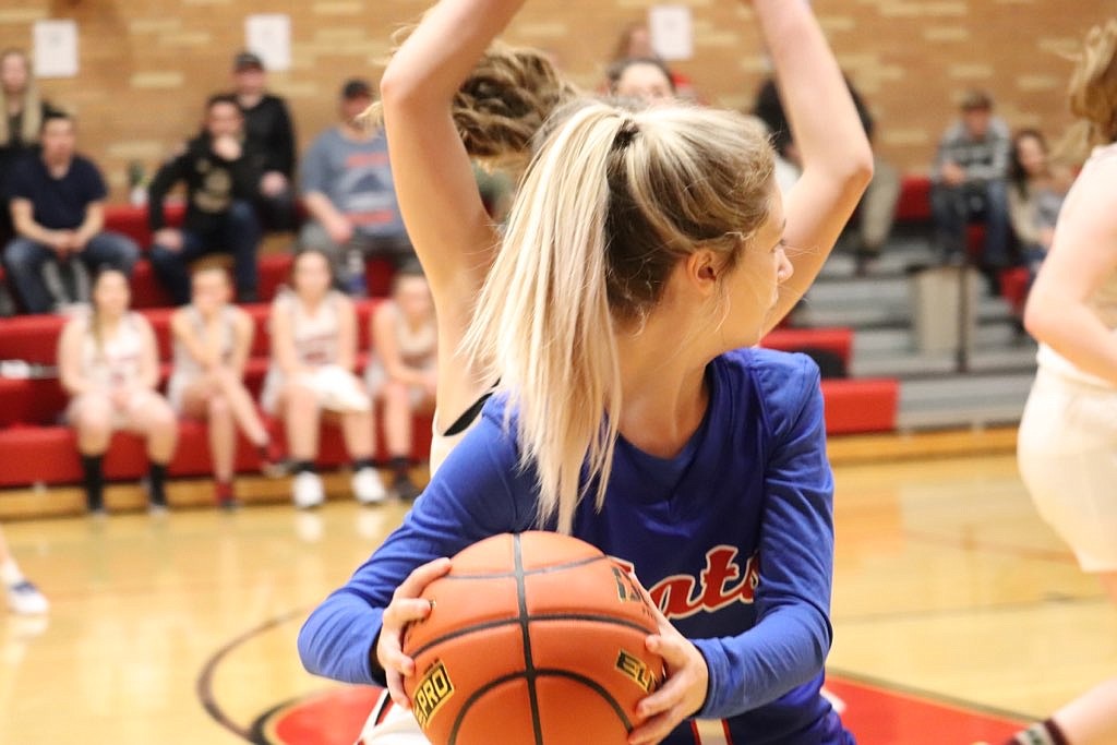 Superior's Darby Haskins looks for passing room during the Lady Bobcat s win over Noxon Saturday night in Noxon. (Kami Milender/for The MI)