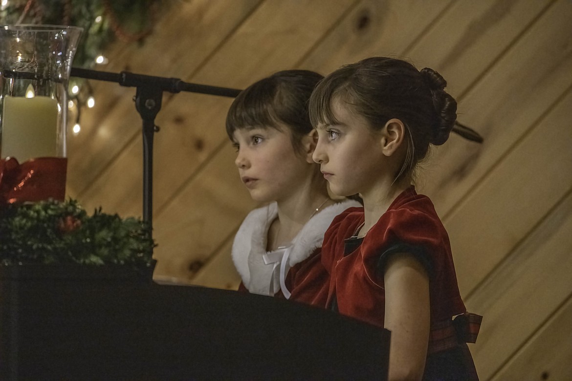 Anaelle and Ailie Avilla perform at a Christmas concert Dec. 10 at Plains Bible Chapel. (Tracy Scott/Valley Press)