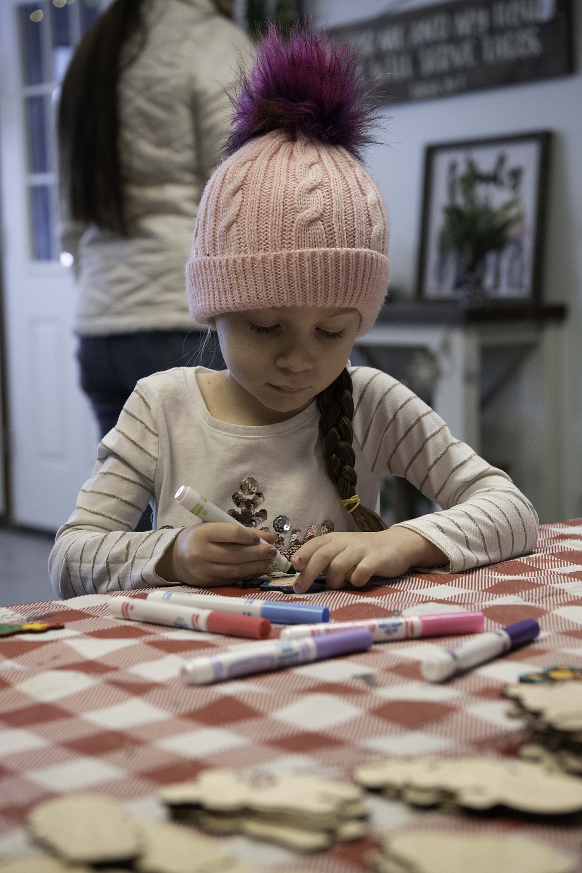 Cooper Spurr works on an art project. (Tracy Scott/Valley Press)