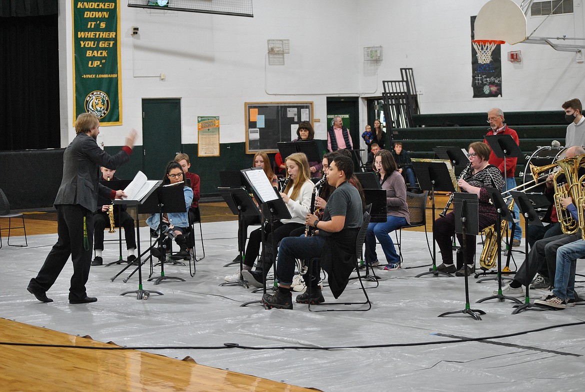 St. Regis Music Teacher, and newly named Superintendent Derek Larson led his high school band in a series of holiday tunes on December 13. Due to poor road conditions, Mullan High School band students were unable to attend the performance as planned, and the concert was also reduced in number with other students being sick or absent. But in true community fashion, musically gifted locals stepped in to fill in the gaps which is a favorite form of collaboration for Larson. The concert ended with some audience participation singing along to Jingle Bells, Silent Night, and We Wish You a Merry Christmas. (Amy Quinlivan/Mineral Independent)