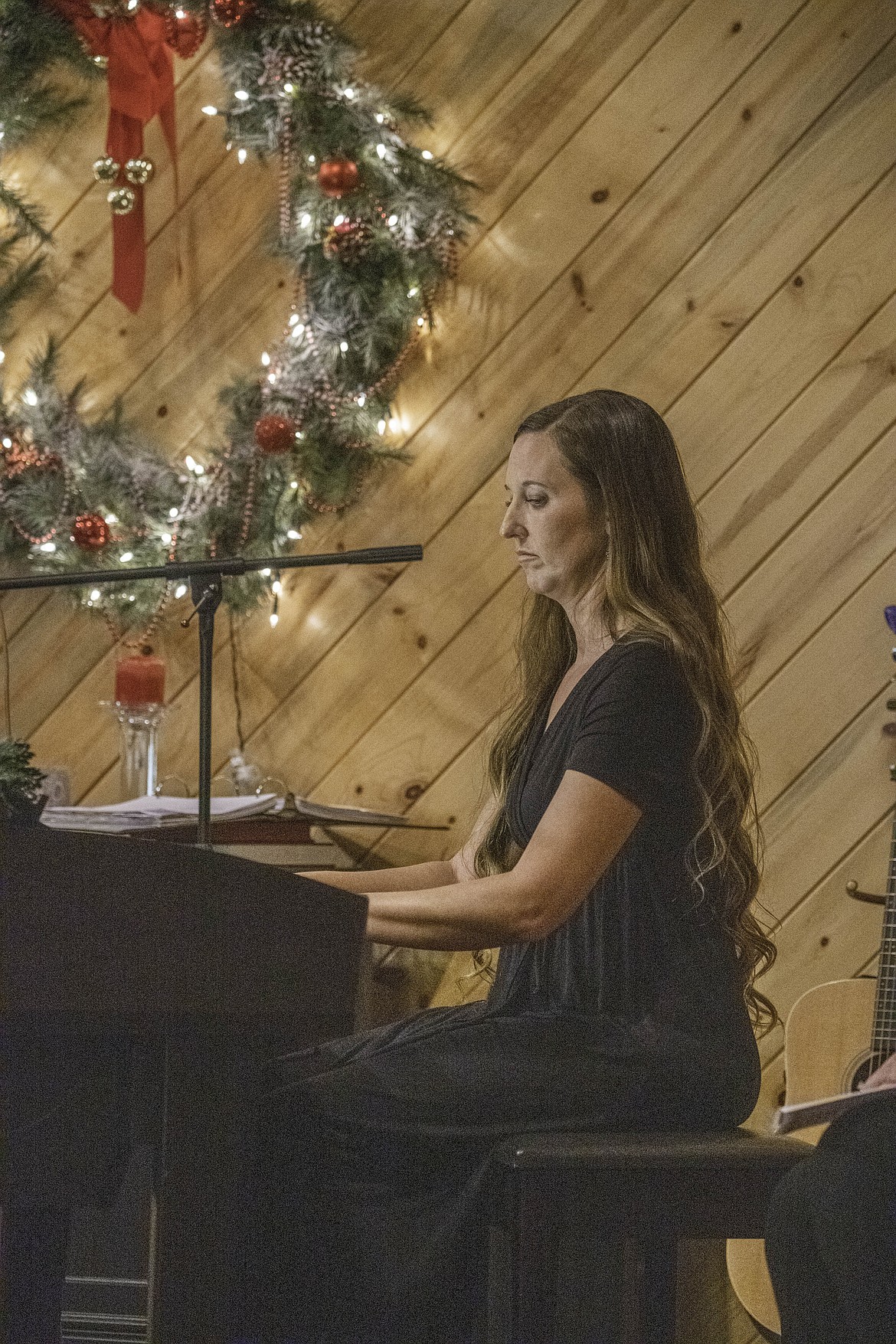 Mayme Ercanbrack plays piano at a Christmas concert Dec. 10 at Plains Bible Chapel. (Tracy Scott/Valley Press)