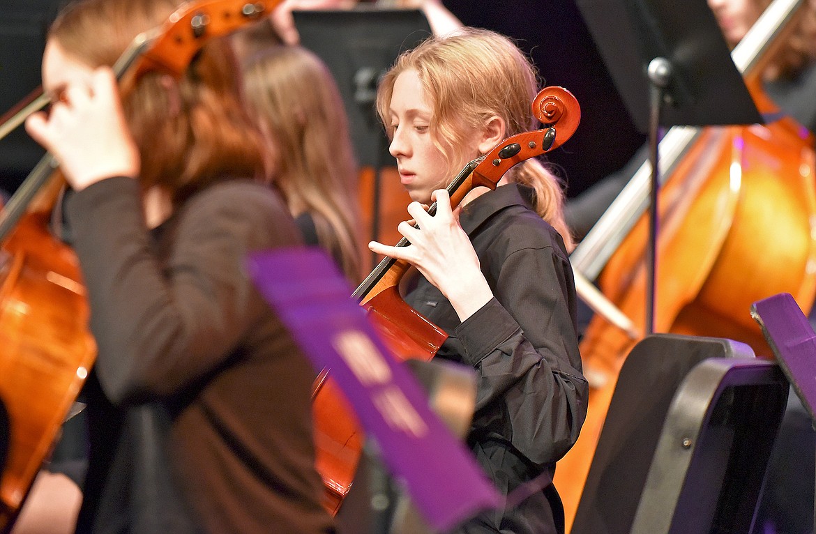 Koru Larimore plays with the WMS eighth grade orchestra during the holiday concert on Dec. 7 at the Whitefish Performing Arts Center. (Whitney England/Whitefish Pilot)