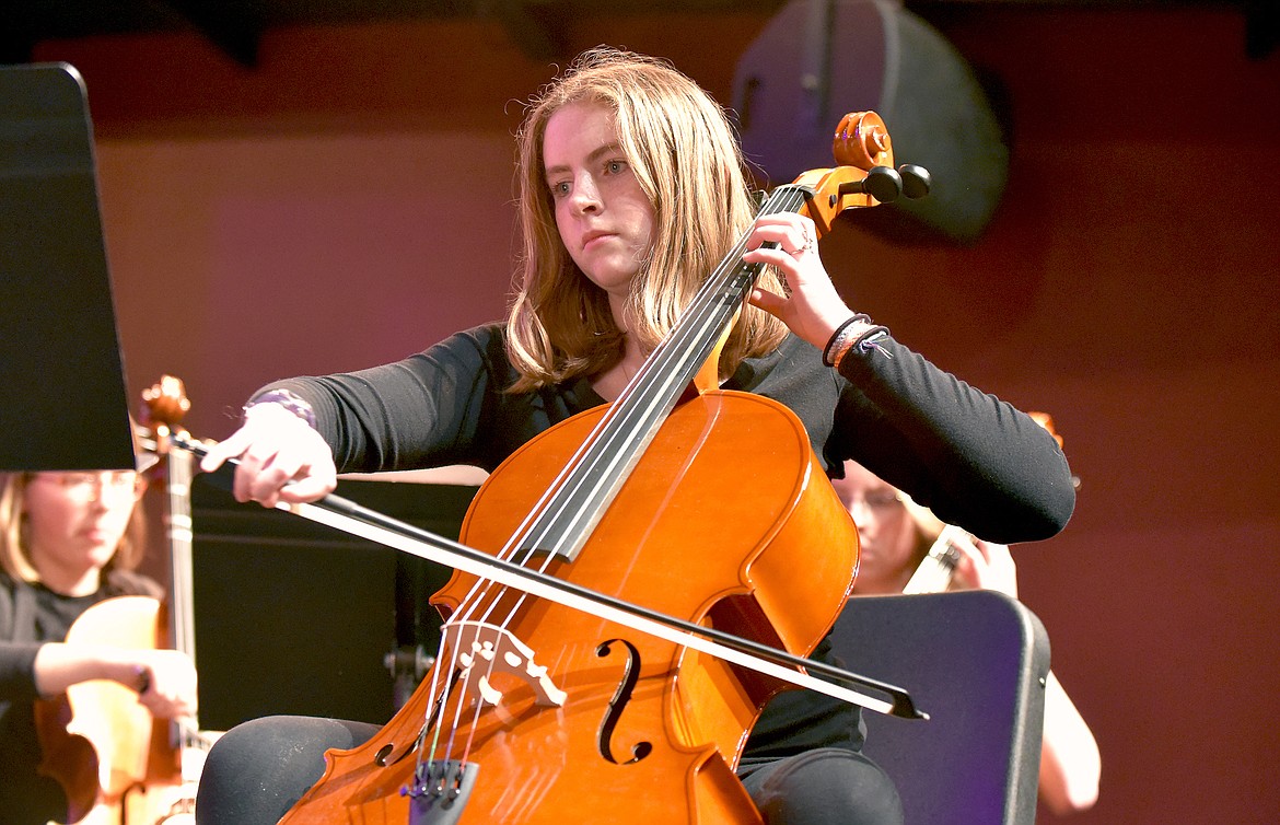 WMS student Johanna Perkins plays with the eighth grade orchestra during the holiday concert on Dec. 7 at the Whitefish Performing Arts Center. (Whitney England/Whitefish Pilot)