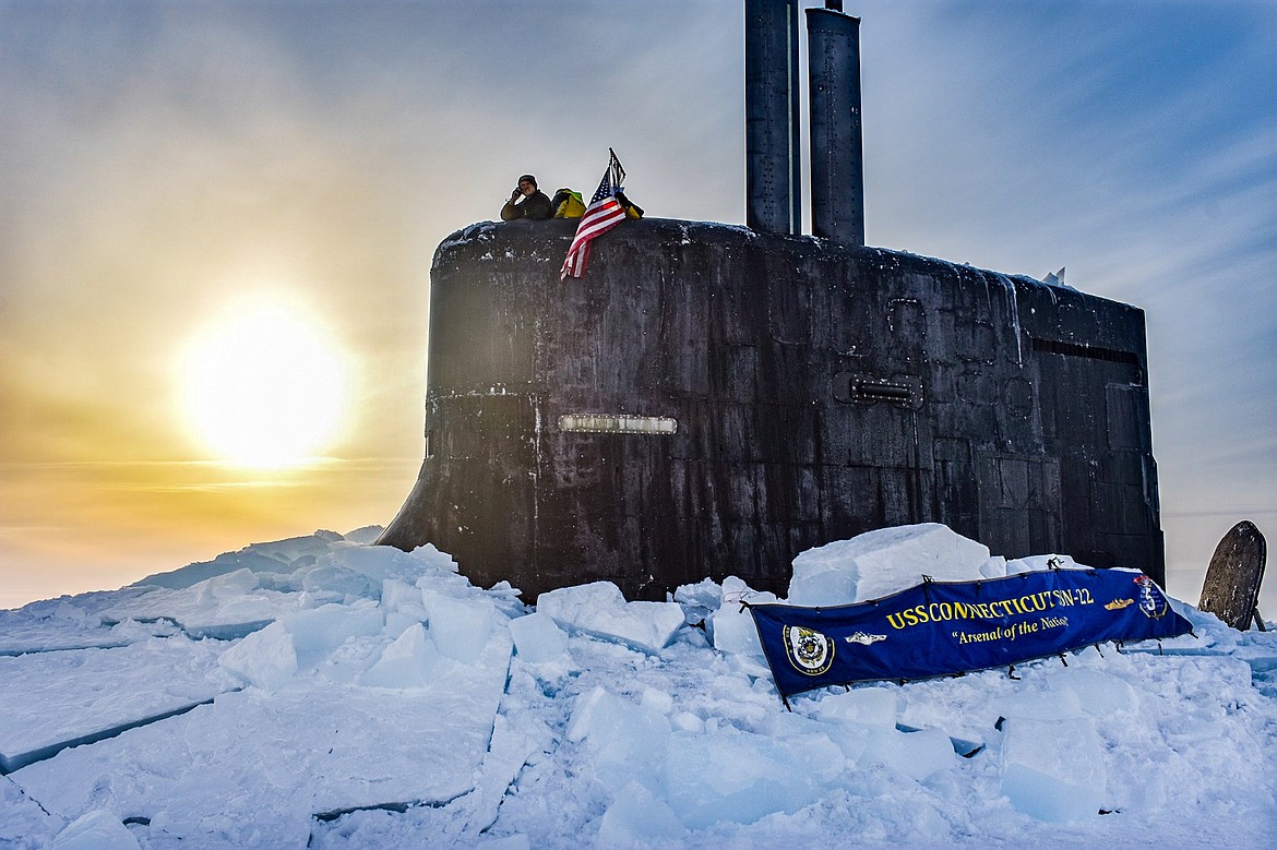 Seawolf-class fast-attack nuclear submarine USS Connecticut (SSN 22) on surface in the Beaufort Sea inside the Arctic Circle during biennial naval exercises with allies to maintain operational readiness.