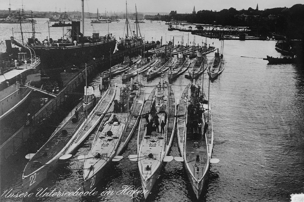 U-20, second from left shown here in Kiel, Germany, is the submarine that sank the RMS Lusitania in 1915 killing 1,198 — helping bring the U.S. into World War I (photo 1914).