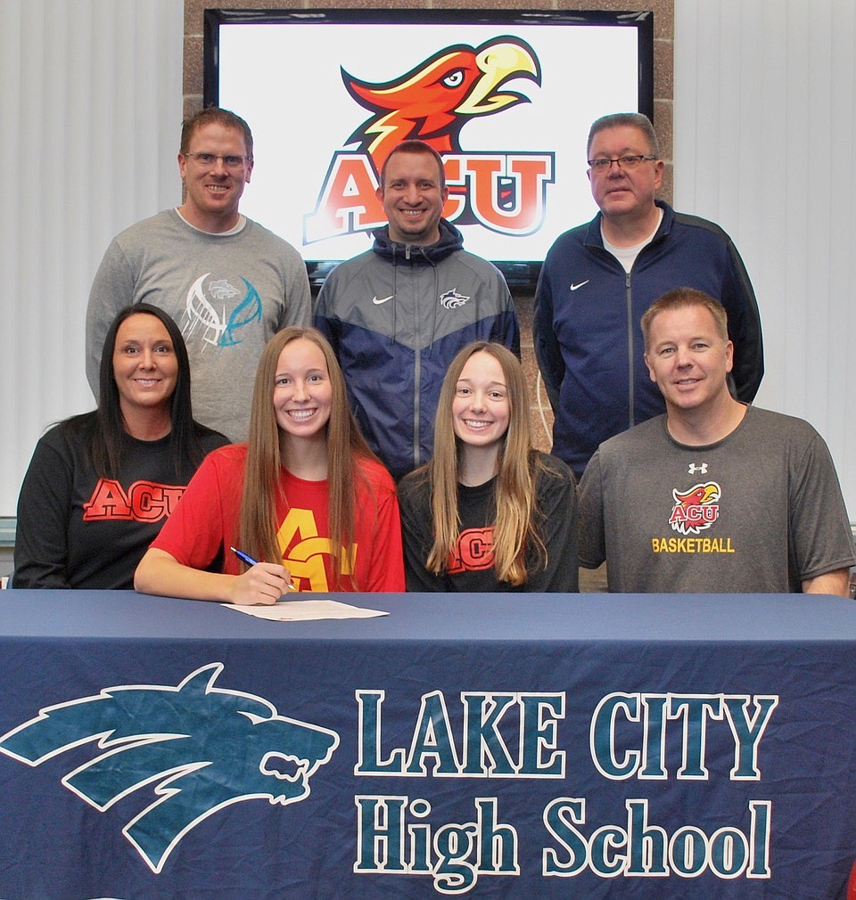 Courtesy photo
Lake City High senior Kendall Pickford recently signed a letter of intent to play basketball at NAIA Arizona Christian University in Glendale, Ariz. Seated from left are Tambra Pickford (mom), Kendall Pickford, Kamryn Pickford (sister) and Kevin Pickford (dad); and standing from left, James Anderson, Lake City High head girls basketball coach; Troy Anderson, Lake City High assistant girls basketball coach; and Jim Winger, Lake City High athletic director.
