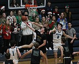 PREP BOYS BASKETBALL: Subs get their moment as Lake City wins big