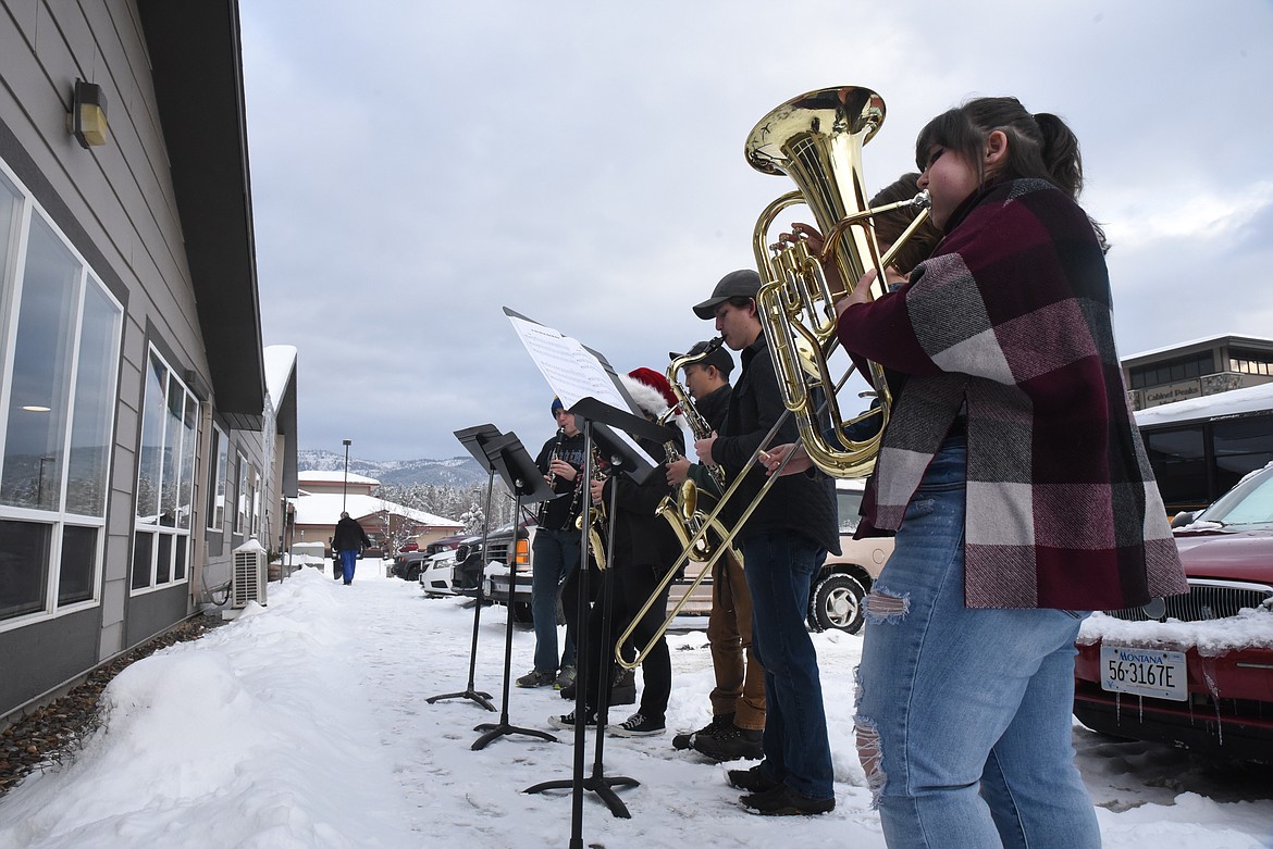 Members of the Libby Middle High School band and choir performed Christmas carols for residents of the Libby Care Center on Dec. 22. (Derrick Perkins/The Western News)