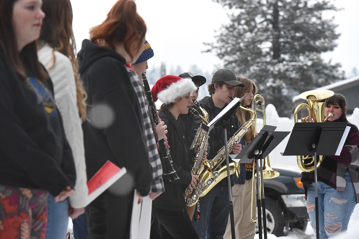 Members of the Libby Middle High School band and choir performed Christmas carols for residents of the Libby Care Center on Dec. 22. (Derrick Perkins/The Western News)