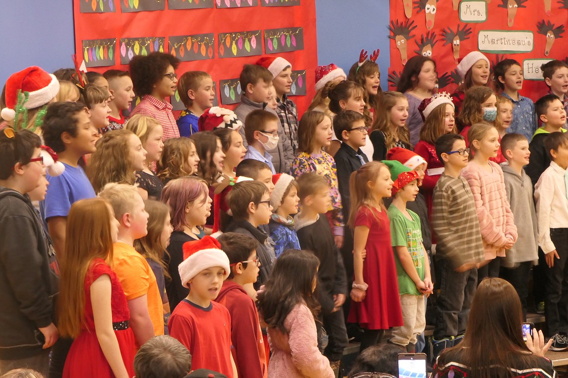 Students at Libby Elementary School perform holiday songs and carols in the lead up to Christmas. (Suzanne Resch/The Western News)