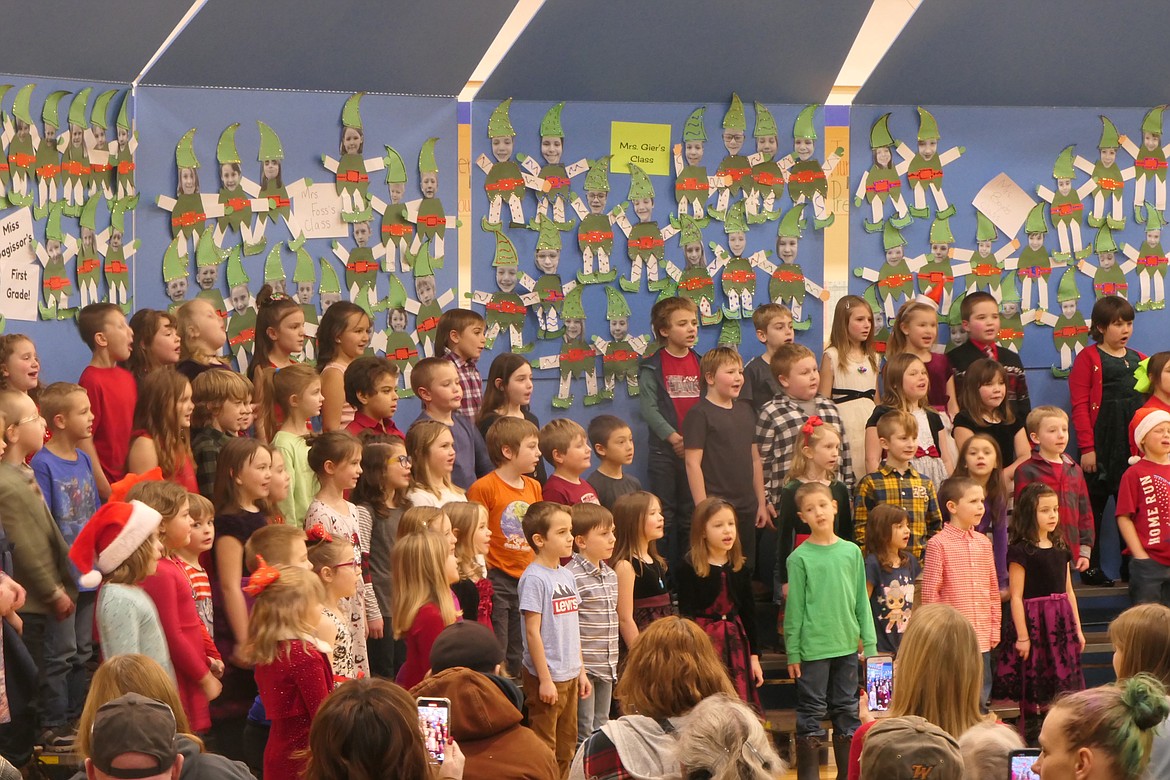Students at Libby Elementary School perform holiday songs and carols in the lead up to Christmas. (Suzanne Resch/The Western News)
