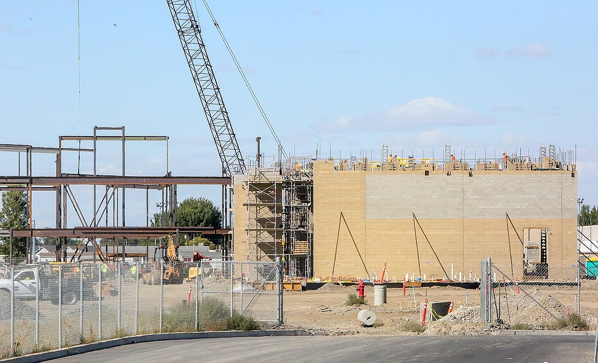 Work is continuing after a controversial banner with epithets directed at President Joe Biden were displayed on a banner at the construction site for Moses Lake School District’s Vanguard Academy, above, which is expected to open in late 2022.