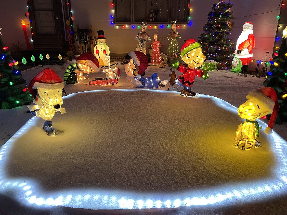 The “Peanuts” gang takes to the ice in this display in Brady Wiltbank’s front yard.