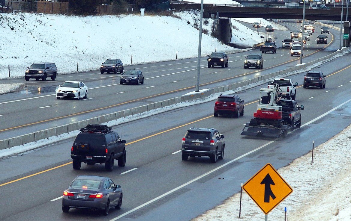Traffic flows in both directions on Interstate 90 through Coeur d'Alene Wednesday, Dec. 22, 2021.