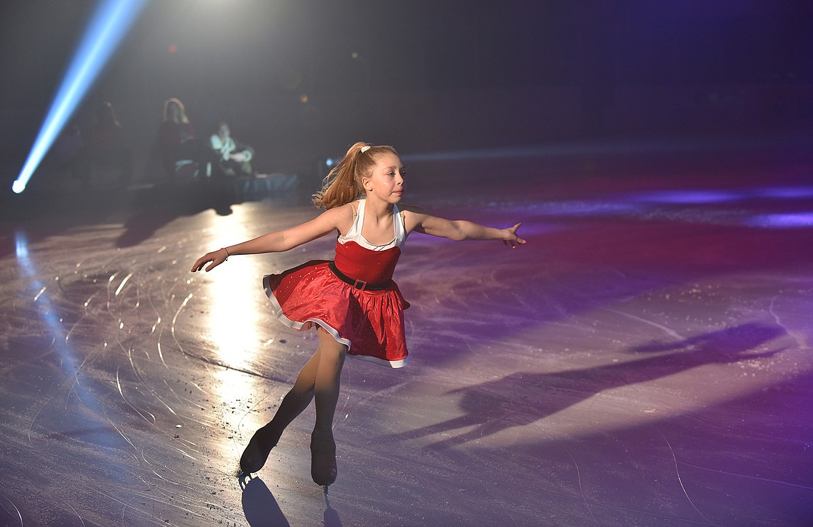 Karlee Brown skates around the Stumptown Ice Den during the Glacier Skate Academy’s Christmas on Ice show. (Heidi Desch/Whitefish Pilot)