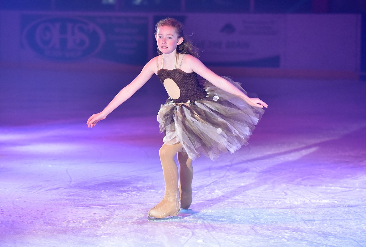 Eloise Pleasants skates during the song “Run Run Rudolph” during the Glacier Skate Academy’s Christmas on Ice show. (Heidi Desch/Whitefish Pilot)