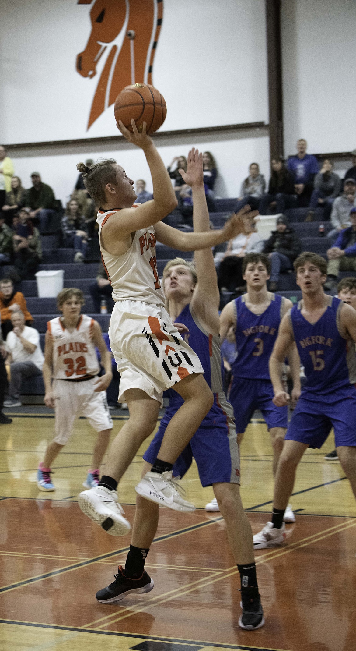 Plains' Jayden Weeks with a bucket against Bigfork. (Tracy Scott/Valley Press)