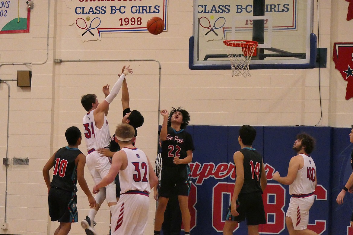 Superior forward Anthony Mueller tosses up two of his 18 points during Tuesday;s win over Two Eagle River in Superior.  (Chuck Bandel/Valley Press)