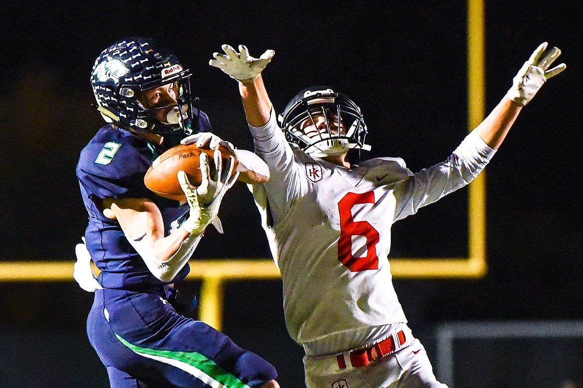 Glacier wide receiver Connor Sullivan (2) holds on to a reception in the third quarter against Missoula Hellgate at Legends Stadium on Thursday, Oct. 21. (Casey Kreider/Daily Inter Lake)
