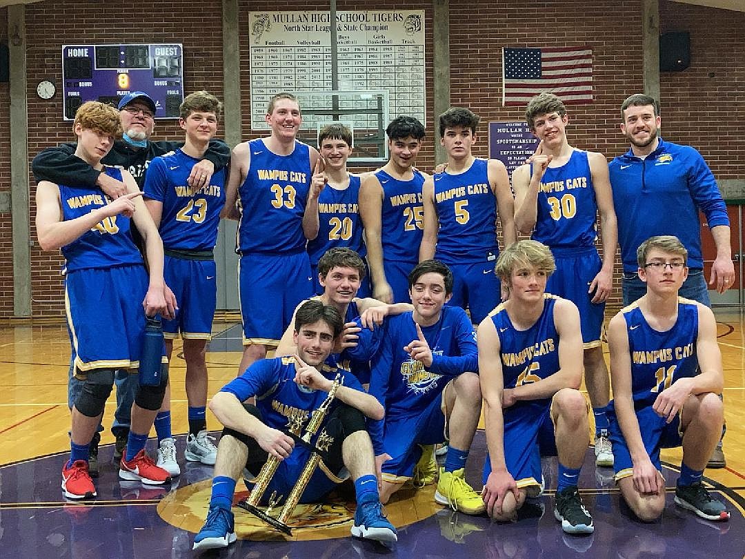 The Clark Fork boys basketball team celebrates after defeating Mullan 53-24 in the 1A Division II District 1 championship game last winter to advance to state for the first time since 2008.