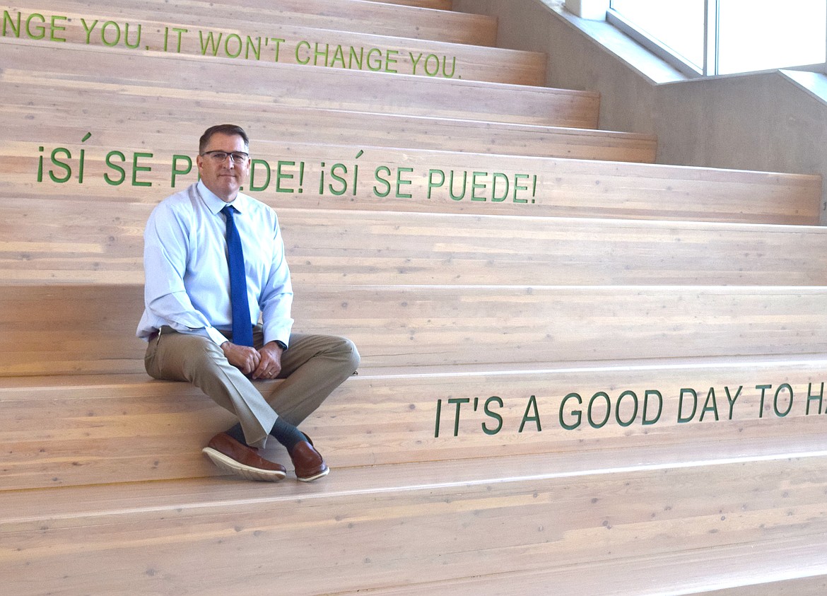 Quincy Superintendent John Boyd sits in the entryway of the new Quincy High School in 2020.