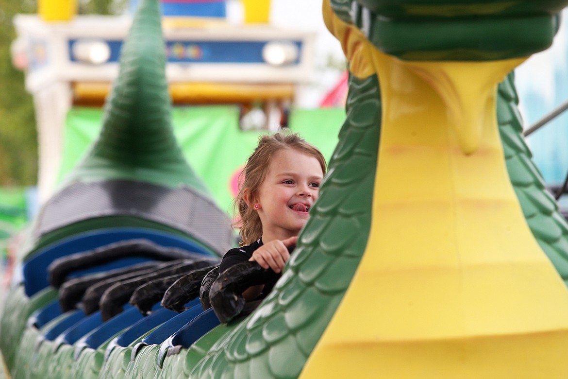 Rainy Zupan of the Silver Valley smiles as she enjoys a ride at the North Idaho State Fair on opening day, Aug. 20.