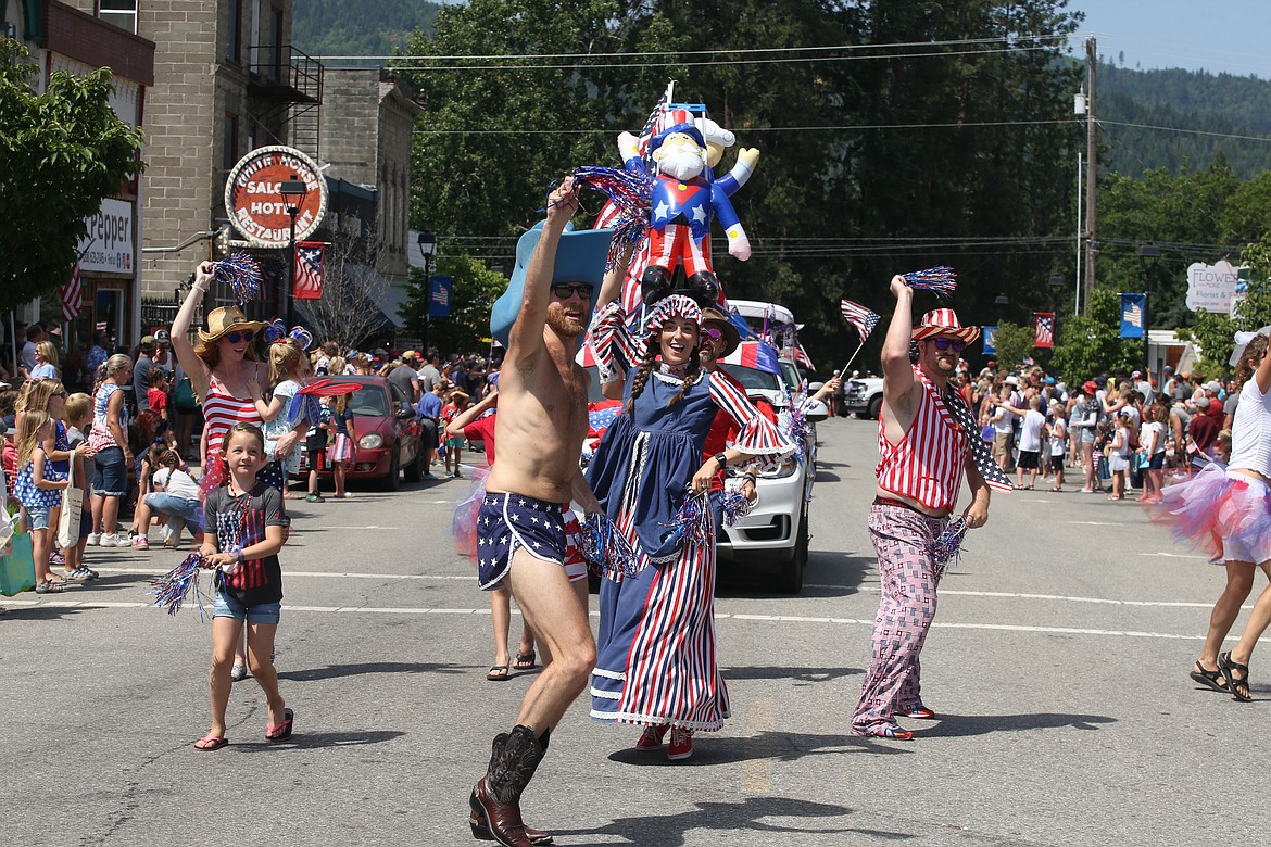 Colorful and creative dancers make their way up Maine Street during the Fourth of July parade in Spirit Lake on July 4.