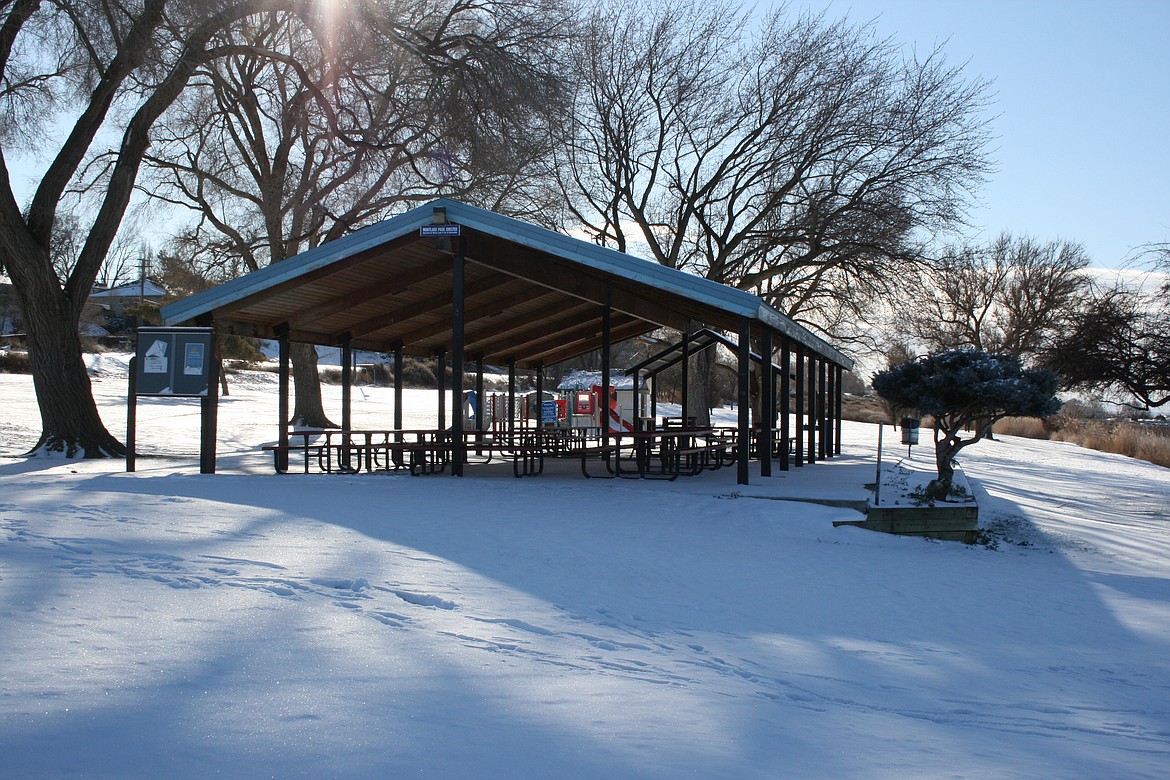 Montlake Park in Moses Lake is shown under a blanket of snow Friday.