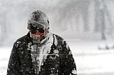 School, work, travel can wait as snow blankets U.S. capital