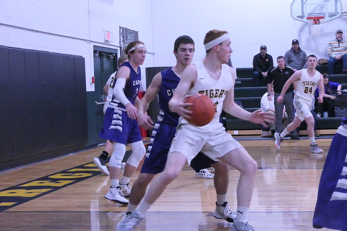 St. Regis forward Tanner Day has emerged as one of the leading scorers and rebounders in 14C. (Chuck Bandel/Valley Press)