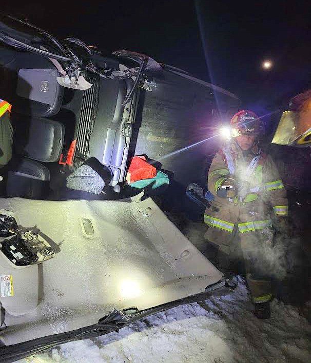 Photo courtesy David McCullough
A firefighter responds to the scene of the early morning Dec. 27 crash on Interstate 90 east of Missoula where Tricia McCollough lost control of her truck.