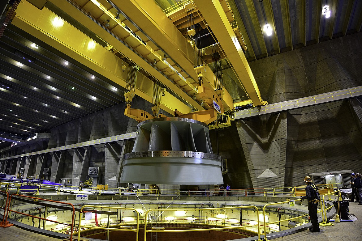 A refurbished runner is placed inside Grand Coulee Dam’s G23 generator. This portion of the dam came back online in 2019. No federal or state dollars were used to pay for the project.